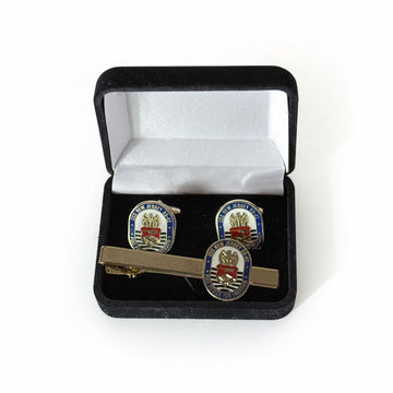 Cufflinks and tie clip set in a black box with white interior