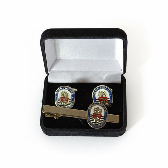 Cufflinks and tie clip set in a black box with white interior