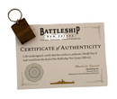 Certificate of Authenticity for World War II teak wood from the Battleship New Jersey with a keychain attached.