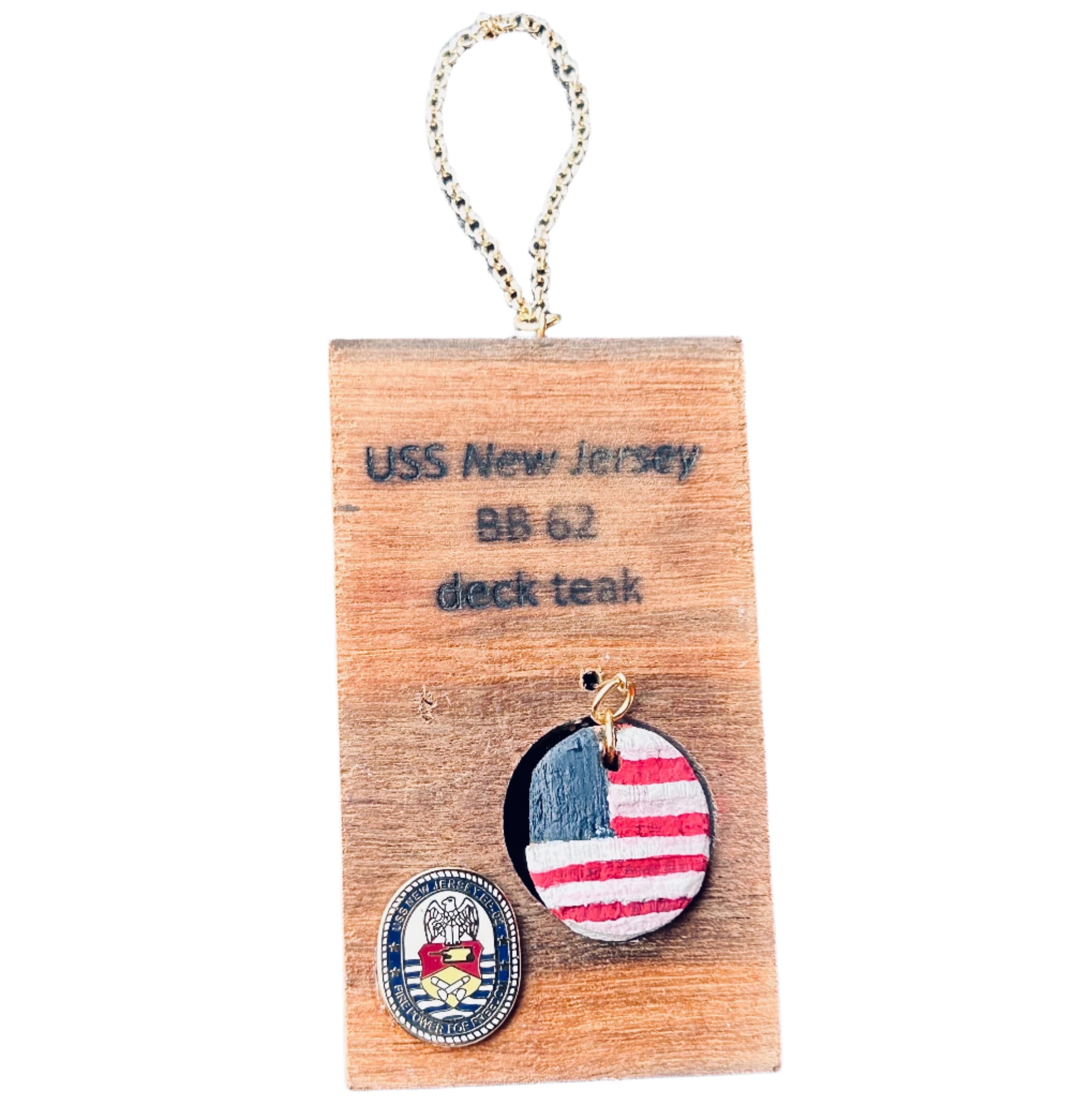 Keychain with American flag design on a wooden card labeled 'USS New Jersey' against a textured gray background.