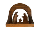 Wooden nativity scene with cut-out figures on a white background