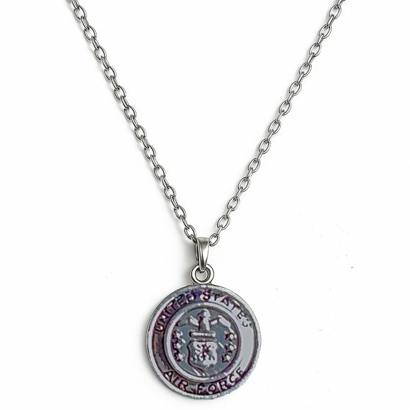 Silver necklace with a round US Air Force pendant on a white background