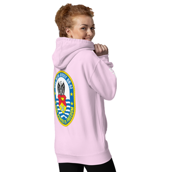 Person wearing a pink hoodie with a logo on the back against a white background